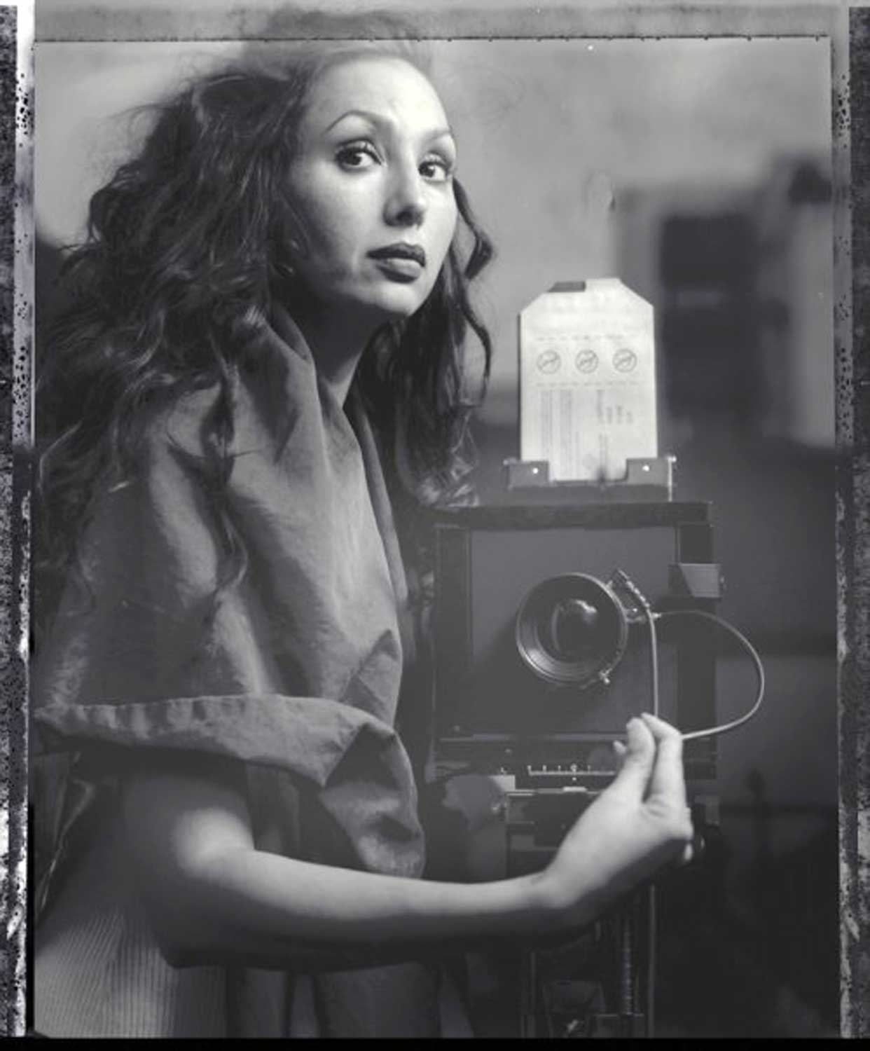 Self portrait on polaroid 55 in mirror with Sinar  technical camera